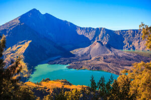 The Mount Rinjani National Park, an expansive 41,330-hectare UNESCO Global Geopark that features diverse entry points and hiking trails tailored to a range of fitness levels, timelines, and travel preferences.
